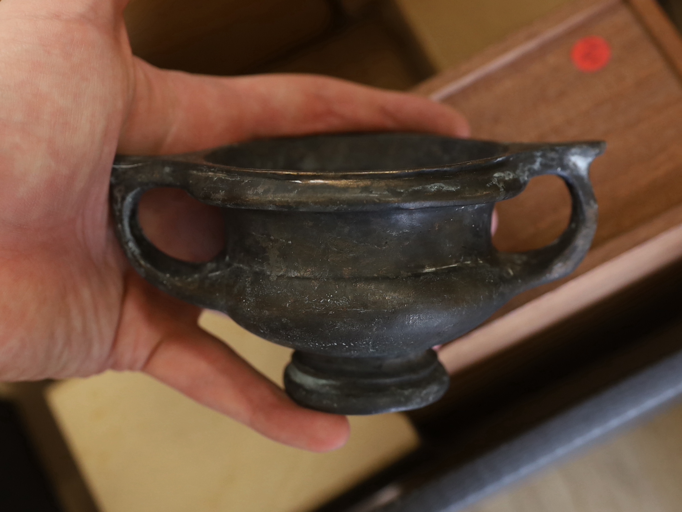 A collection of Turkish reproduction bronzes of archaic vessels and sculptures commissioned as LTD editions by Garanti Bank, some with certificates